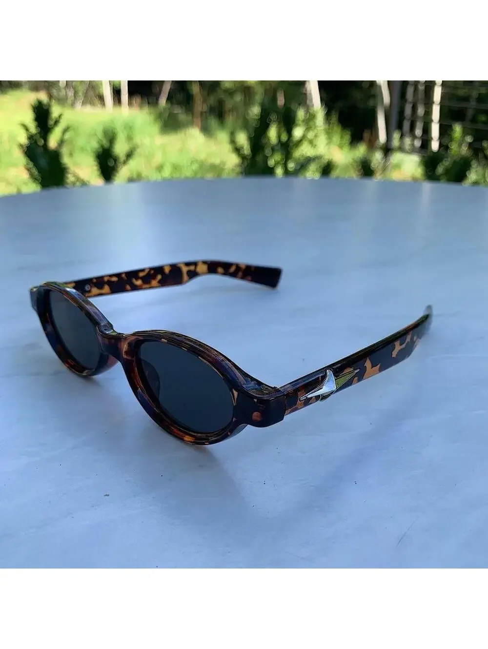 Cyber Star Vintage y2k style cheetah print oval sunglasses. Tinted oval Lenses